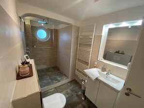 Hair dryer, towels, soap, toilet paper