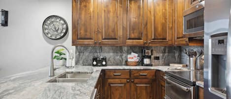 Microwave, stovetop, dishwasher, coffee/tea maker