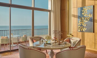 Royal Suite | Living area | 50-inch LED TV with digital channels, fireplace, toys