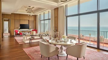 Royal Suite | Living area | 50-inch LED TV with digital channels, fireplace, toys