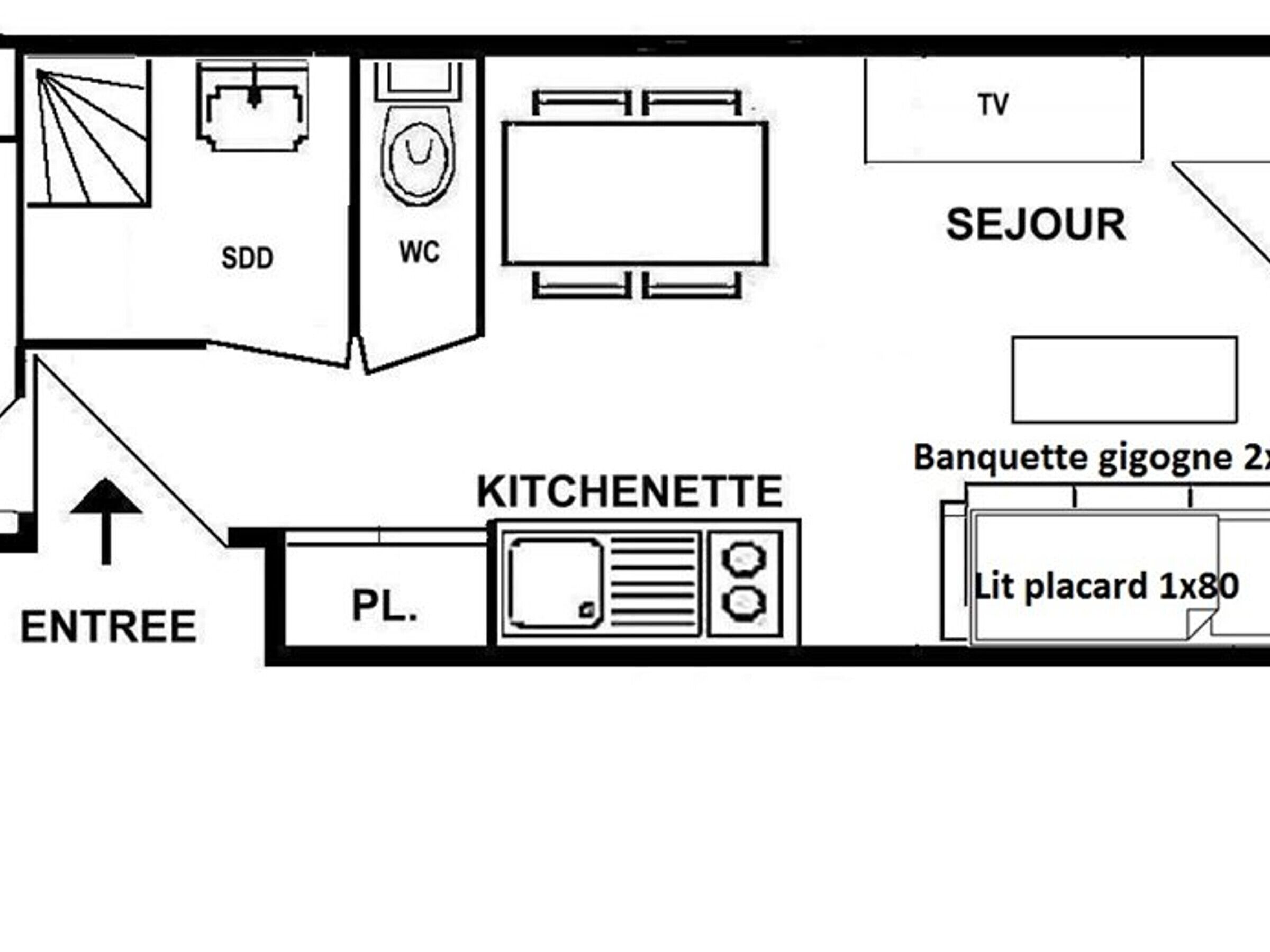 A floor plan with a kitchen, dining area, TV, WC, and a small bathroom.
