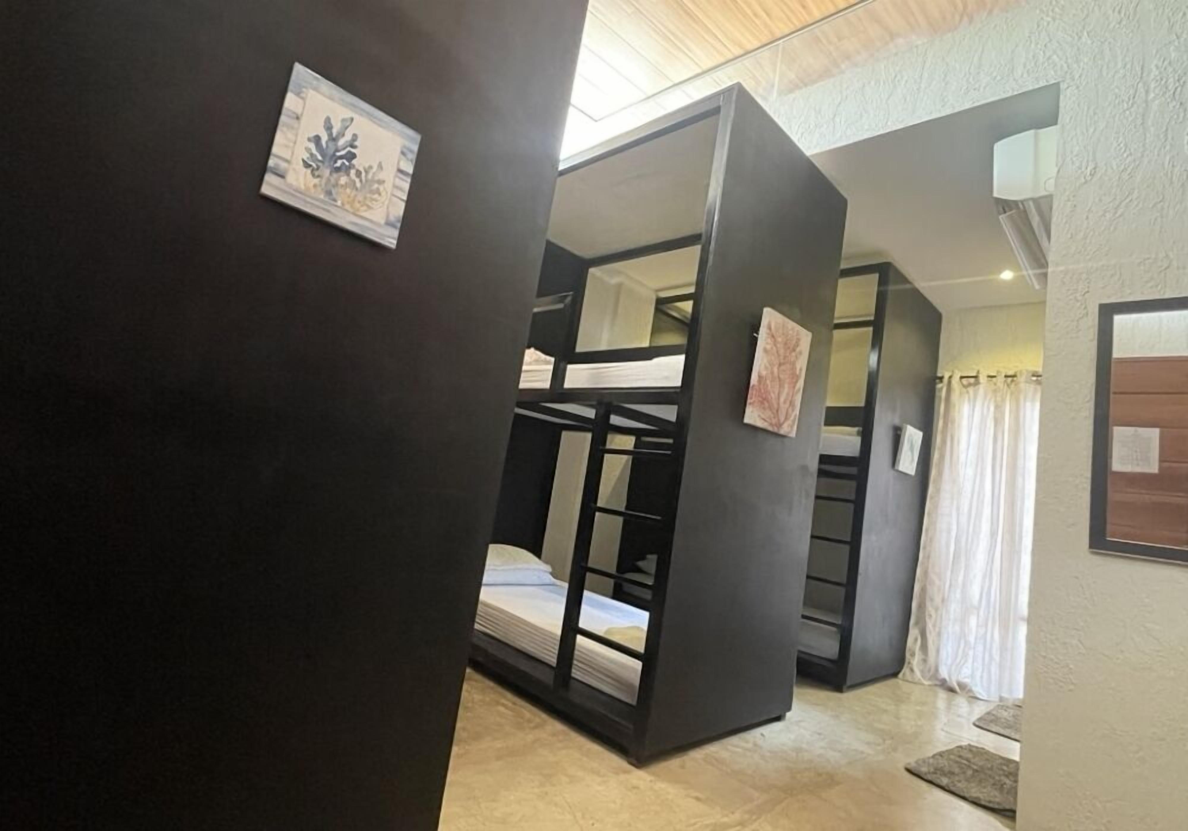 Dormitorio compartido económico | Wifi gratis y ropa de cama 