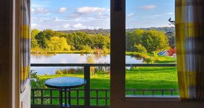 Private, quiet en-suite hut, glorious views to South Downs, wild swimming.