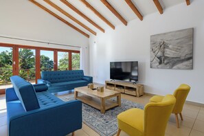 Superior Villa | Living area | Flat-screen TV - San Lameer Villa 14323 (Southbroom)