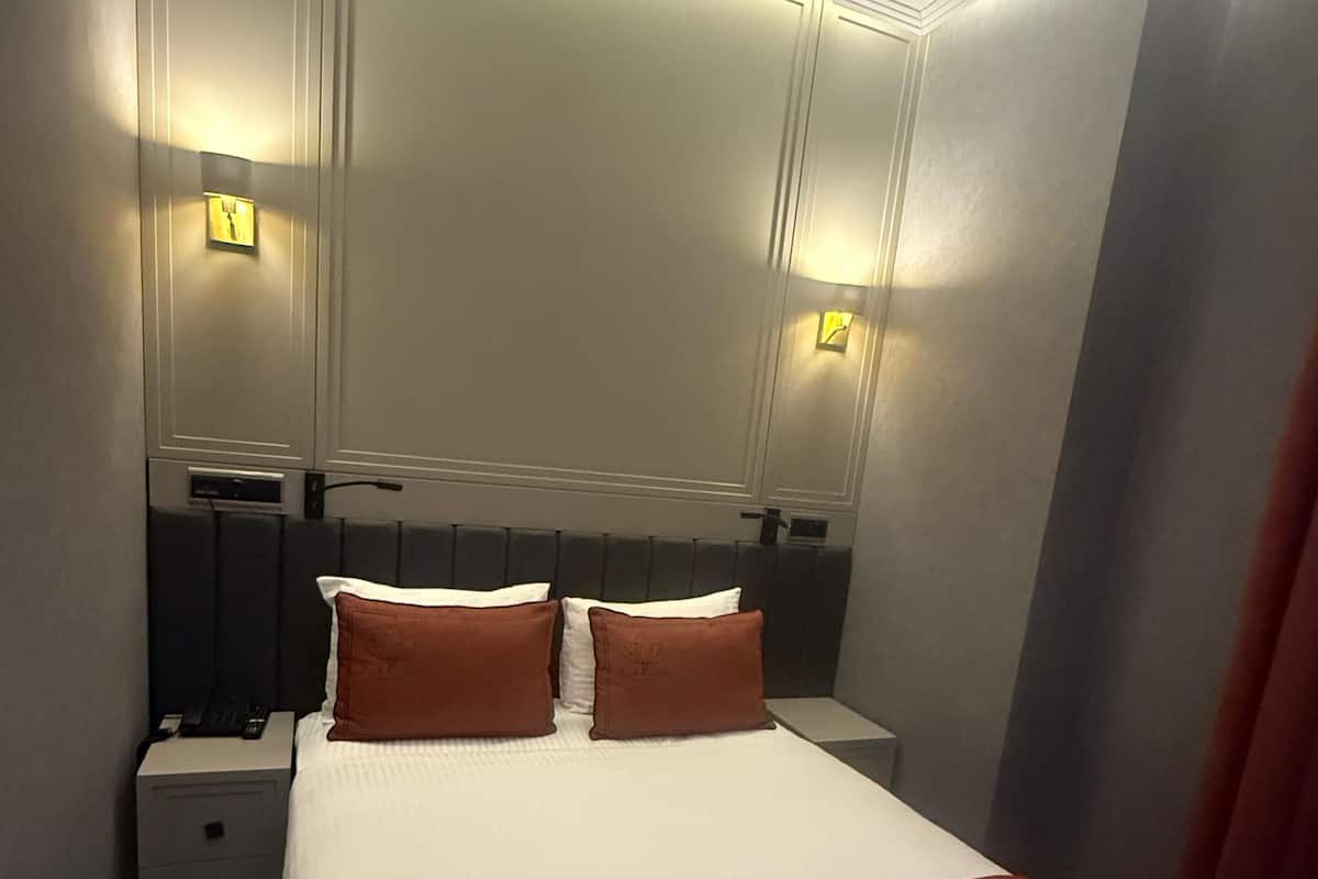 Economy Room | Literie de qualité supérieure, mini-bar avec articles gratuits