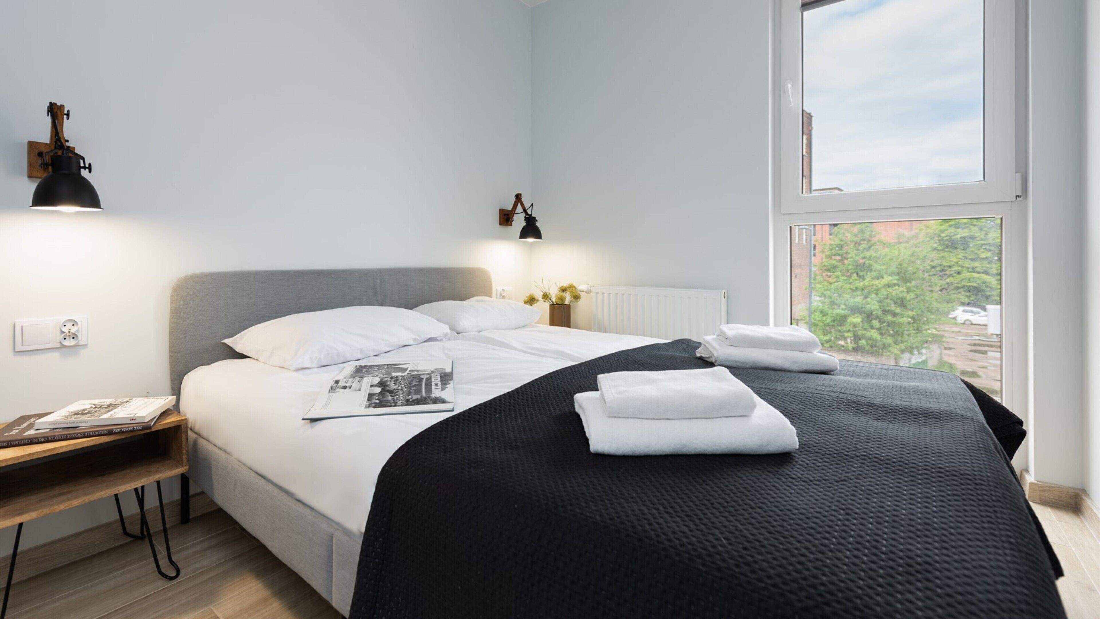 Design-Apartment, 1 Schlafzimmer, Balkon | 1 Schlafzimmer, kostenloses WLAN, Bettwäsche