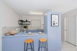 Fridge, microwave, stovetop, coffee/tea maker