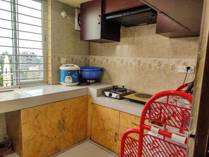 Fridge, oven, cookware/dishes/utensils - Full apartment at central Rajshahi with skyline view,and all modern facilities.  (Rajshahi)