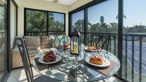 Outdoor dining - Private Beach Access w/Pool and Tennis! (Holmes Beach)