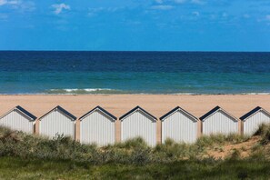 On the beach, sun loungers