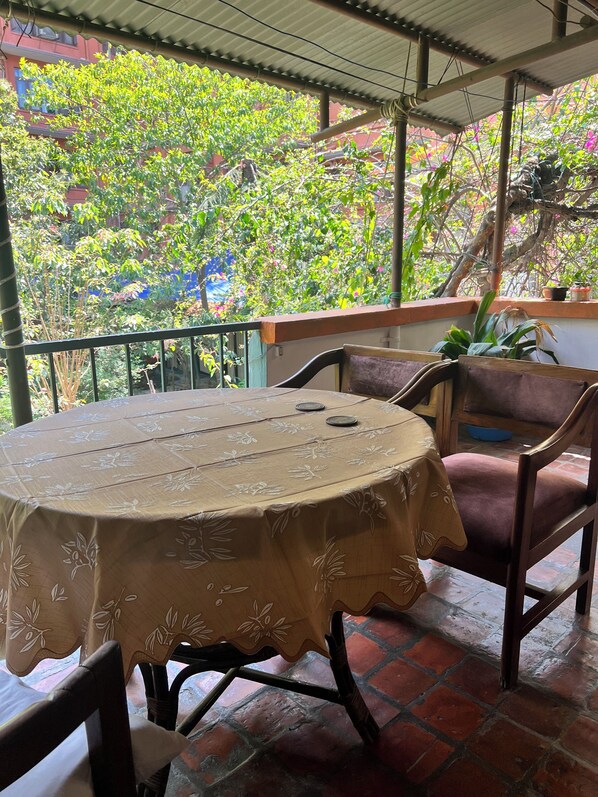 Deluxe Suite, Balcony, Garden View | Terrace/patio