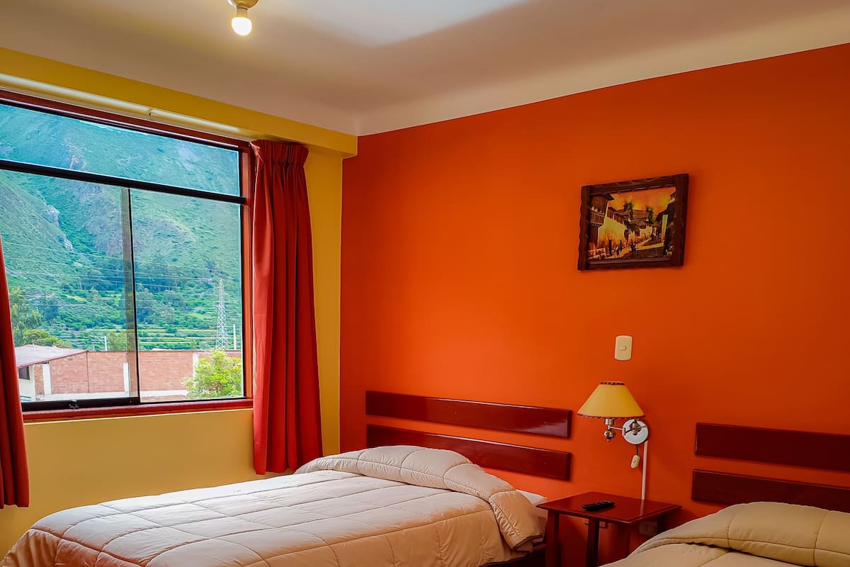 Klassieke Twin kamer, 1 slaapkamer, en-suite badkamer, uitzicht op tuin | Gratis wifi, beddengoed