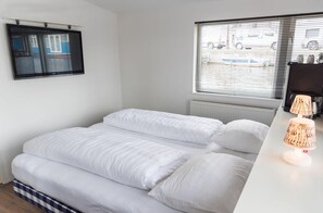 1 多间卧室、客房内保险箱、免费 WiFi、床单