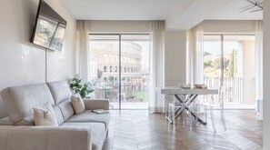 Apartamento, várias camas | Área de estar