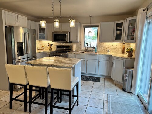 Brick Vacation House On Waldo Blvd w/ Heated Garage, BBQ, Fire Pit