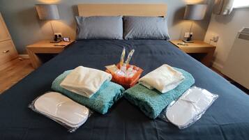 1 bedroom, desk, iron/ironing board, travel crib