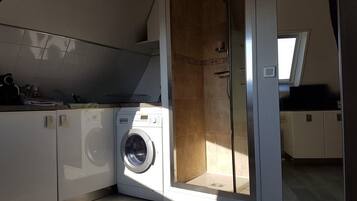 Hair dryer, towels, soap, shampoo