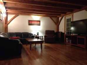 Smart TV, DVD player, foosball, books