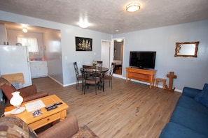 Family Apartment | Living area | 36-inch Smart TV with cable channels - Westport RV Park & Motel (Westport)