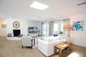 Smart TV, fireplace, books