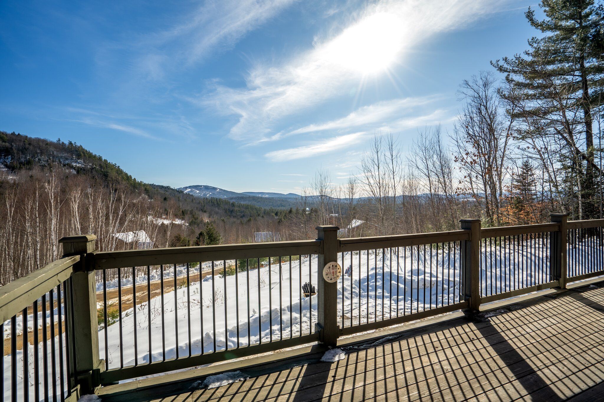 Step onto the deck and embrace breathtaking winter views!