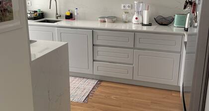 Room with private bathroom in large family apartment