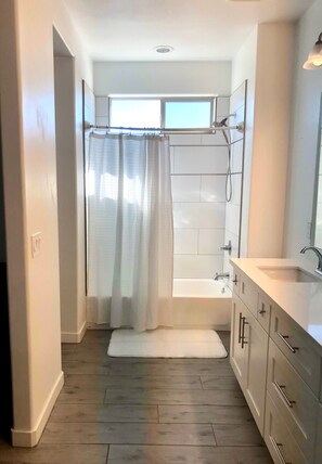 Shower, towels, toilet paper