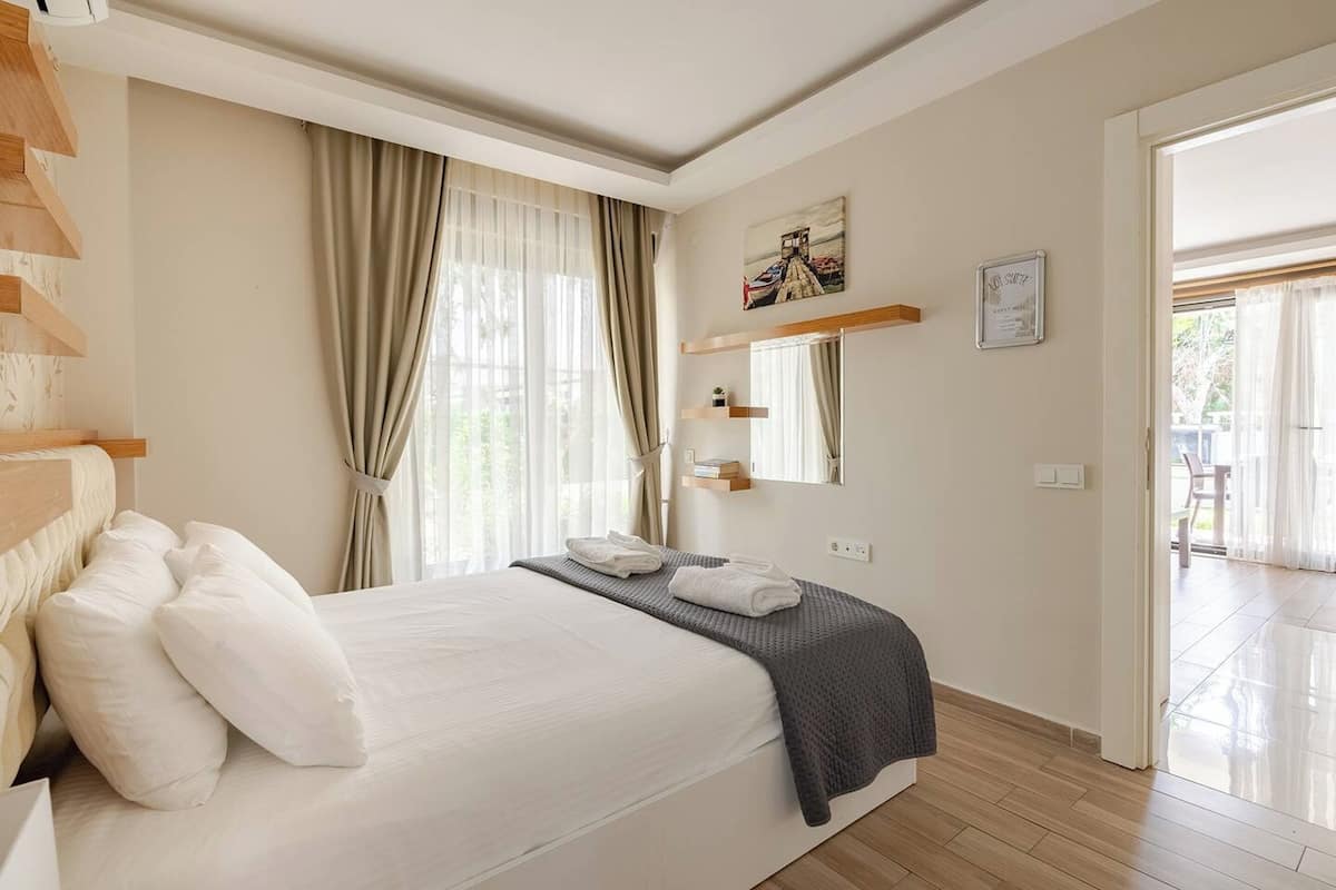 Standaard appartement, 1 slaapkamer, uitzicht op tuin, op benedenverdieping | 1 slaapkamer, luxe beddengoed, individueel gedecoreerd