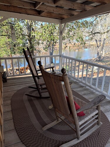 Adorable 2 story lake front setting.