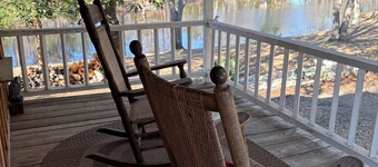 Adorable 2 story lake front setting.