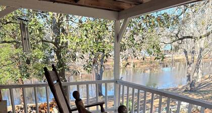 Adorable 2 story lake front setting.