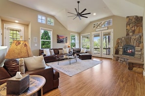 Smart TV, fireplace, books, stereo