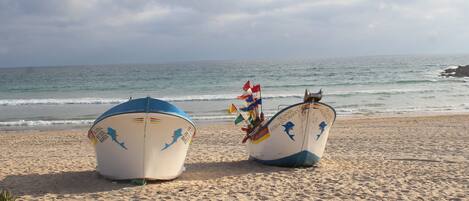 On the beach, sun-loungers, beach towels