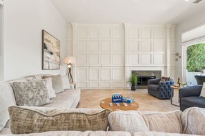 House | Living room | 65-inch Smart TV with satellite channels, fireplace, Netflix