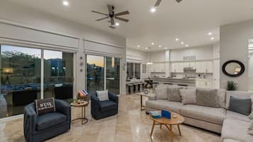 House | Living room | 65-inch Smart TV with satellite channels, fireplace, Netflix