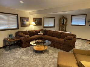 Smart TV, fireplace, books, printers