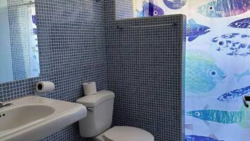 Shower, towels, soap, toilet paper