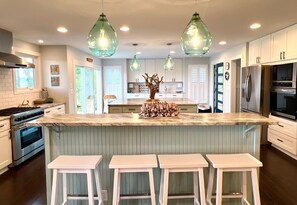 Fridge, microwave, oven, stovetop - Luxury Newly Remodeled Family Beachhouse Marsh Waterviews New to Market Amenity Cards Included. (Seabrook Island)