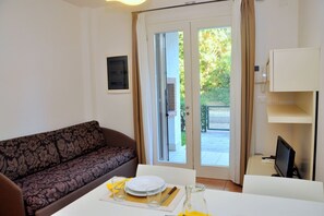 Lägenhet - 1 sovrum - utsikt mot poolen | Vardagsrum