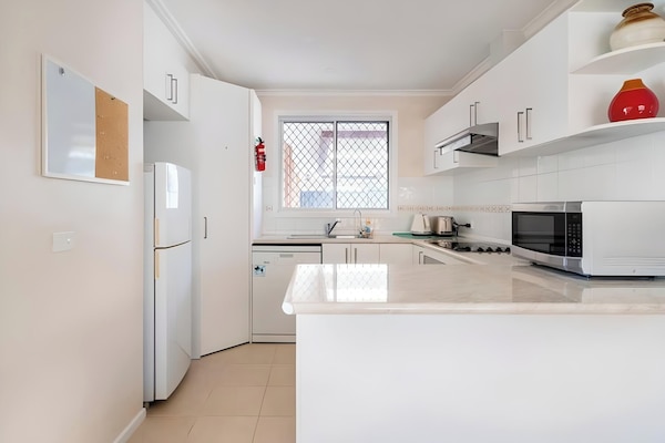 Standard House | Living area | Flat-screen TV