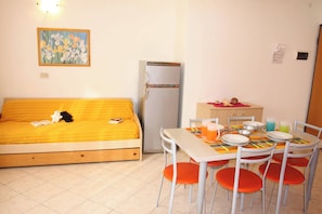 Apartment, 2 Bedrooms, Balcony, Ocean View | Dining room - Two- Bedroom Flat With sea View in Bibione (San Michele al Tagliamento)