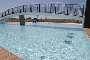 Appartamento, 1 camera da letto, patio, vista giardino | Piscina | Piscina all'aperto