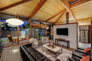 Smart TV, fireplace, books