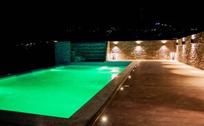 Outdoor pool, open 6:00 AM to 10:00 PM, pool umbrellas, sun loungers