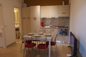 Apartment, 1 Bedroom, Patio, Garden View | Living area - Modern Flat With Garden - Beahost (San Michele al Tagliamento)