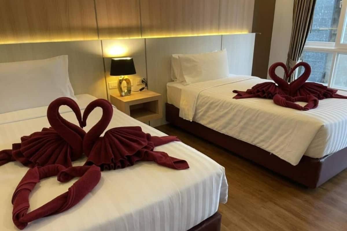 Deluxe-Doppel- oder -Zweibettzimmer, 1 Einzelbett, Stadtblick | Zustellbetten, kostenloses WLAN, Bettwäsche