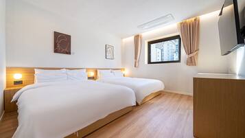Roupas de cama premium, Wi-Fi de cortesia, roupa de cama
