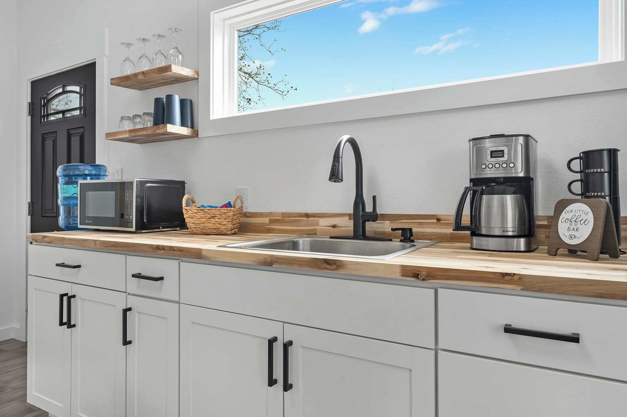 Fridge, microwave, coffee/tea maker, toaster