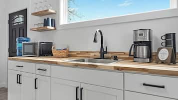 Fridge, microwave, coffee/tea maker, toaster