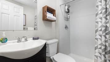 Bathtub, hair dryer, towels